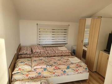 Фото номера Трехместный номер с собственной ванной комнатой Проживание в семье Casa Haralambie г. Greci 2